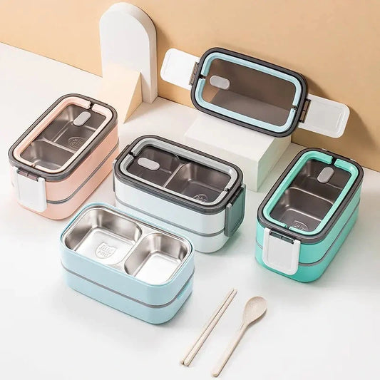 View of a sleek stainless steel double layer lunch box featuring a smooth silver finish and a secure lid design