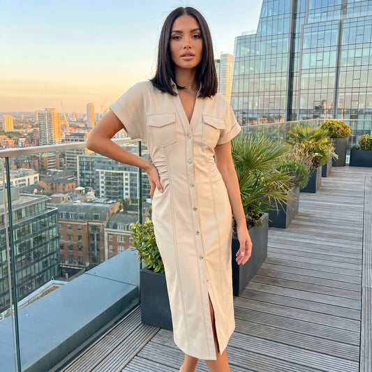 A model showcases the Womens Slim Midi Dress in a soft pastel color, styled with minimal accessories against a neutral backdrop.