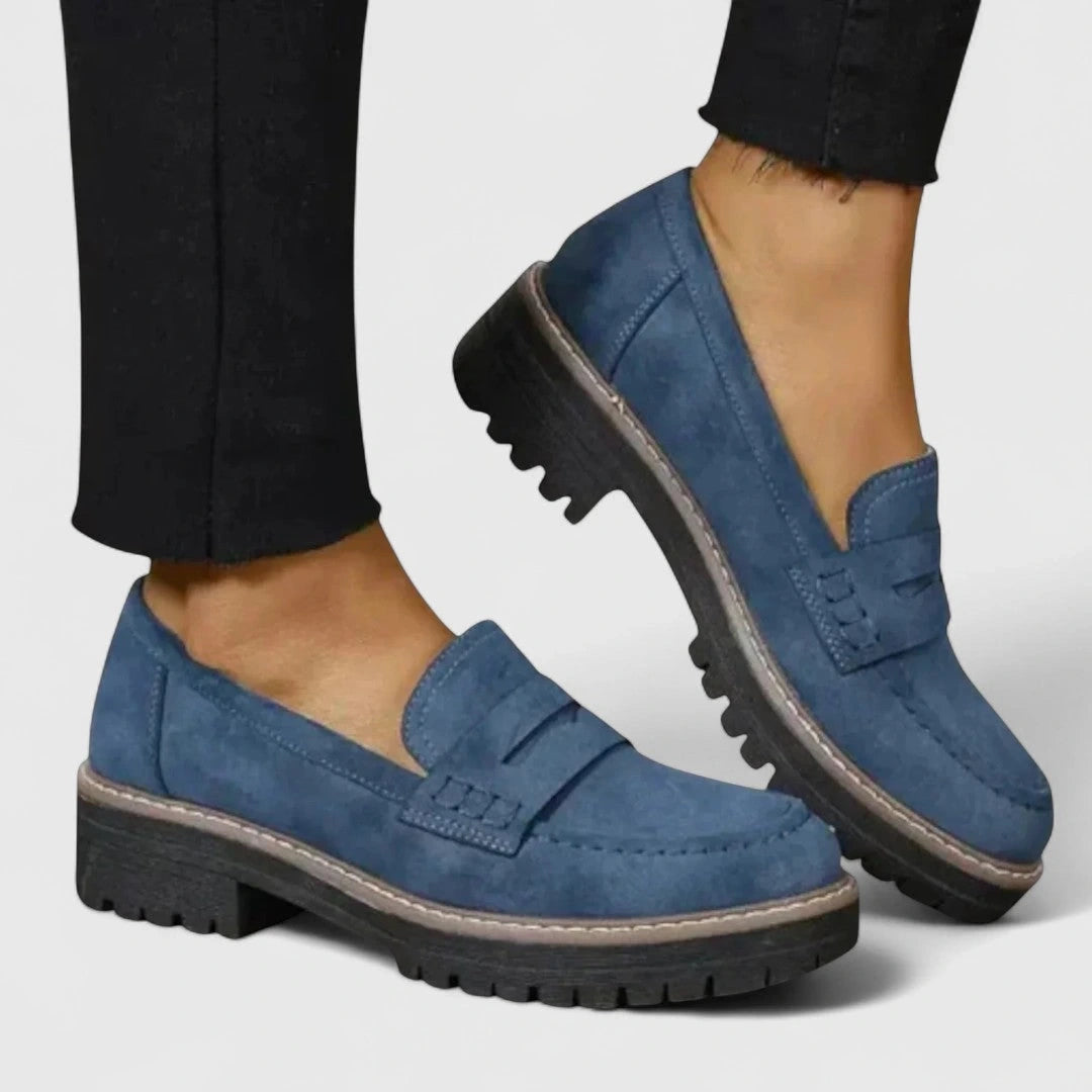 View of elegant women's loafers in soft black leather with a classic design and comfortable orthopaedic support