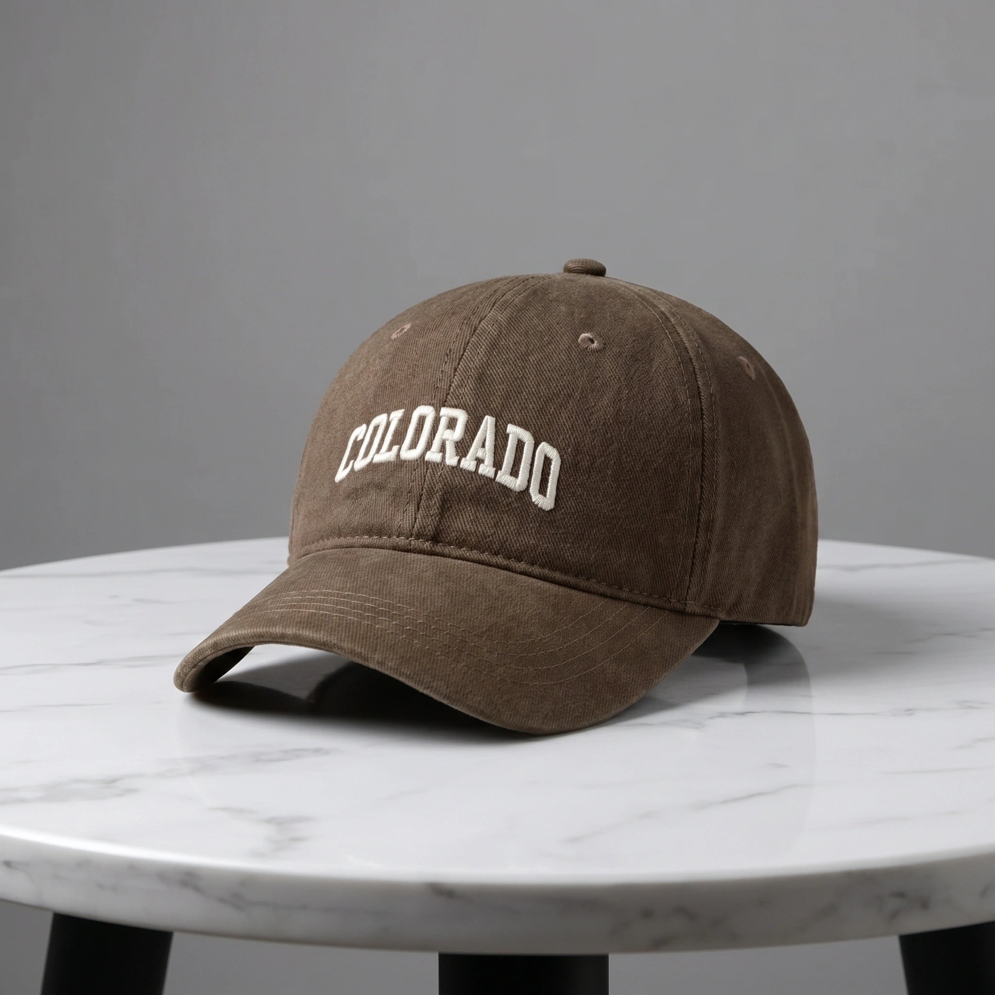 Close up of the CanyonPeak baseball cap showing its durable fabric, precise stitching, and adjustable strap, ideal for outdoor adventures.