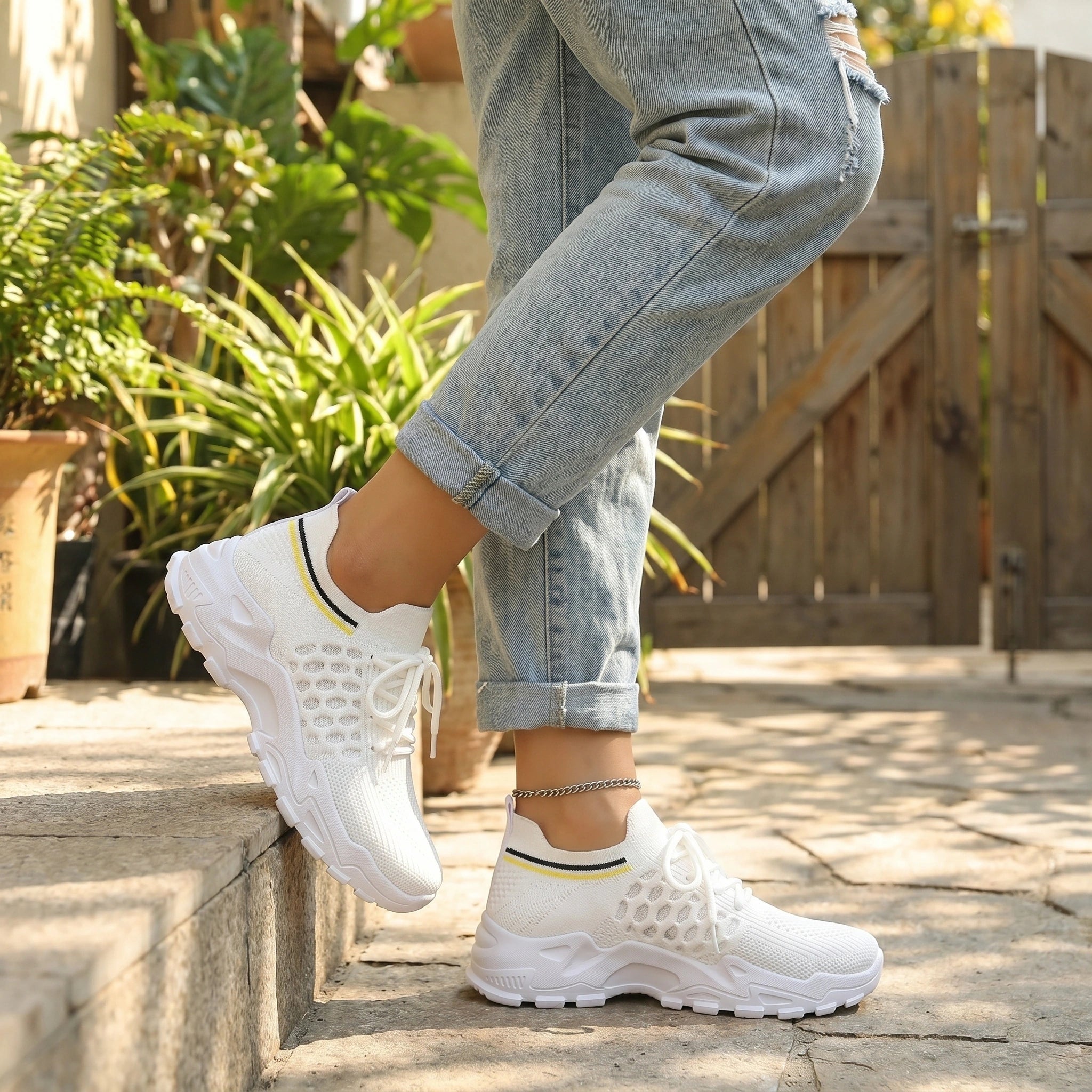 Close up view of the Womens Effortless Supportive Orthopedic Sneakers showing the breathable fabric, precise stitching, and cushioned sole for enhanced comfort.