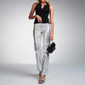 View of stylish high waisted trousers in a soft fabric, featuring a sleek design and tailored fit