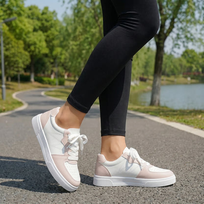 A model showcases the Womens Breathable Light Sport Sneakers in a full front view, styled with a casual outfit against a neutral background.