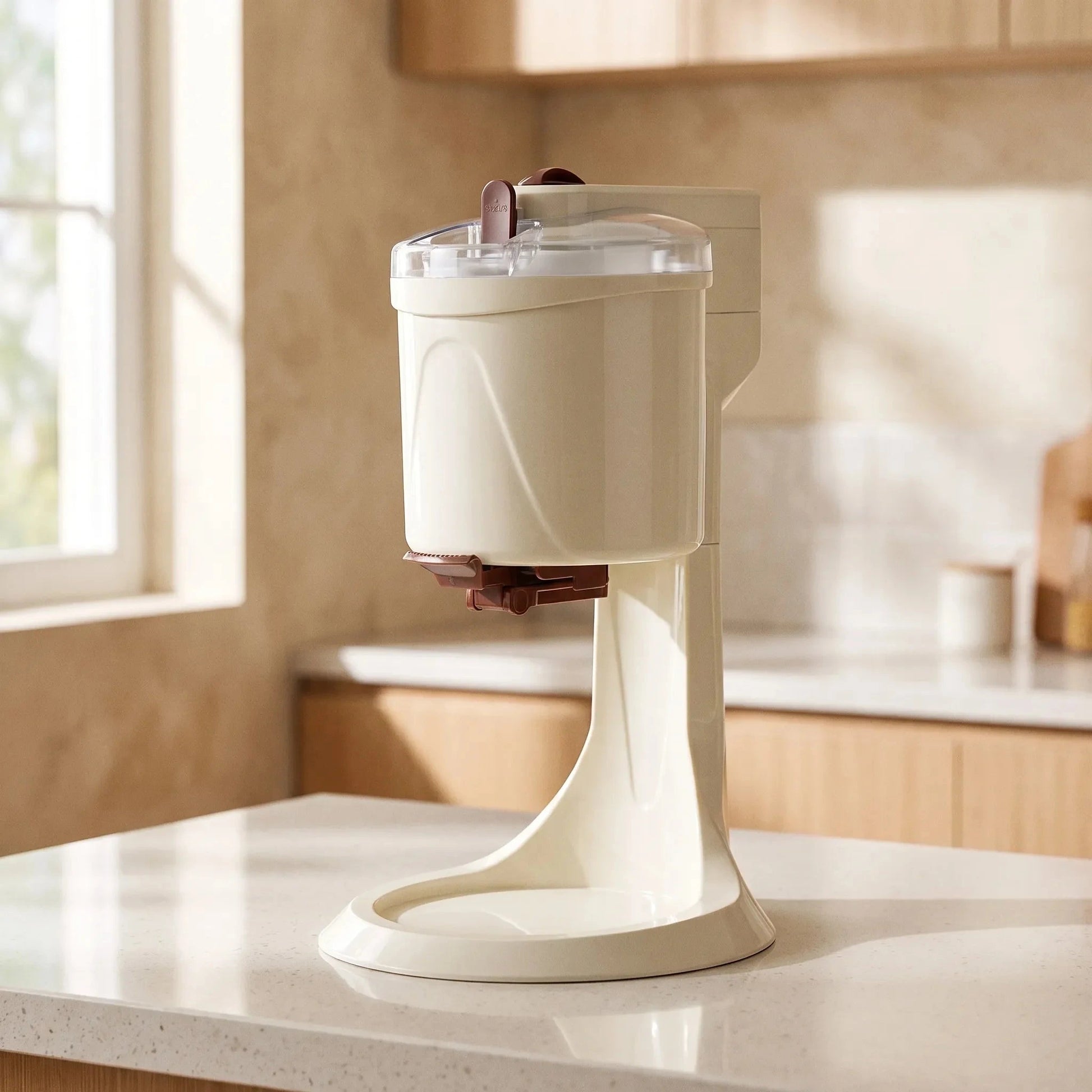 View of a compact electric soft serve ice cream maker, showcasing the control panel, ice cream dispenser, and sleek design