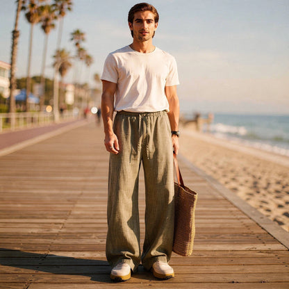 Lightweight summer trousers in light gray, featuring a relaxed fit, drawstring waist, and pockets, view