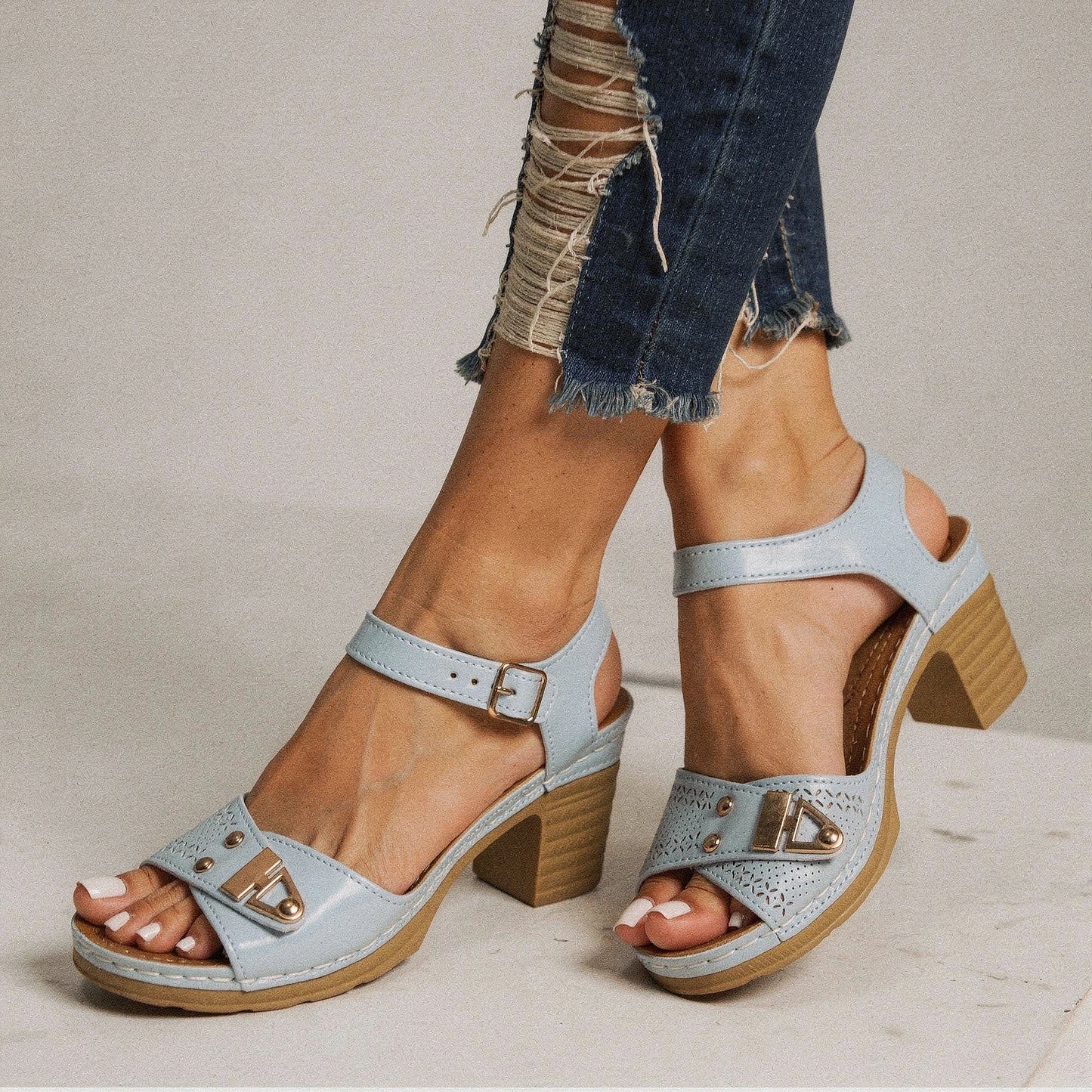 View of trendy adjustable buckle chunky heel sandals in tan, featuring a stylish design and sturdy heel for summer wear