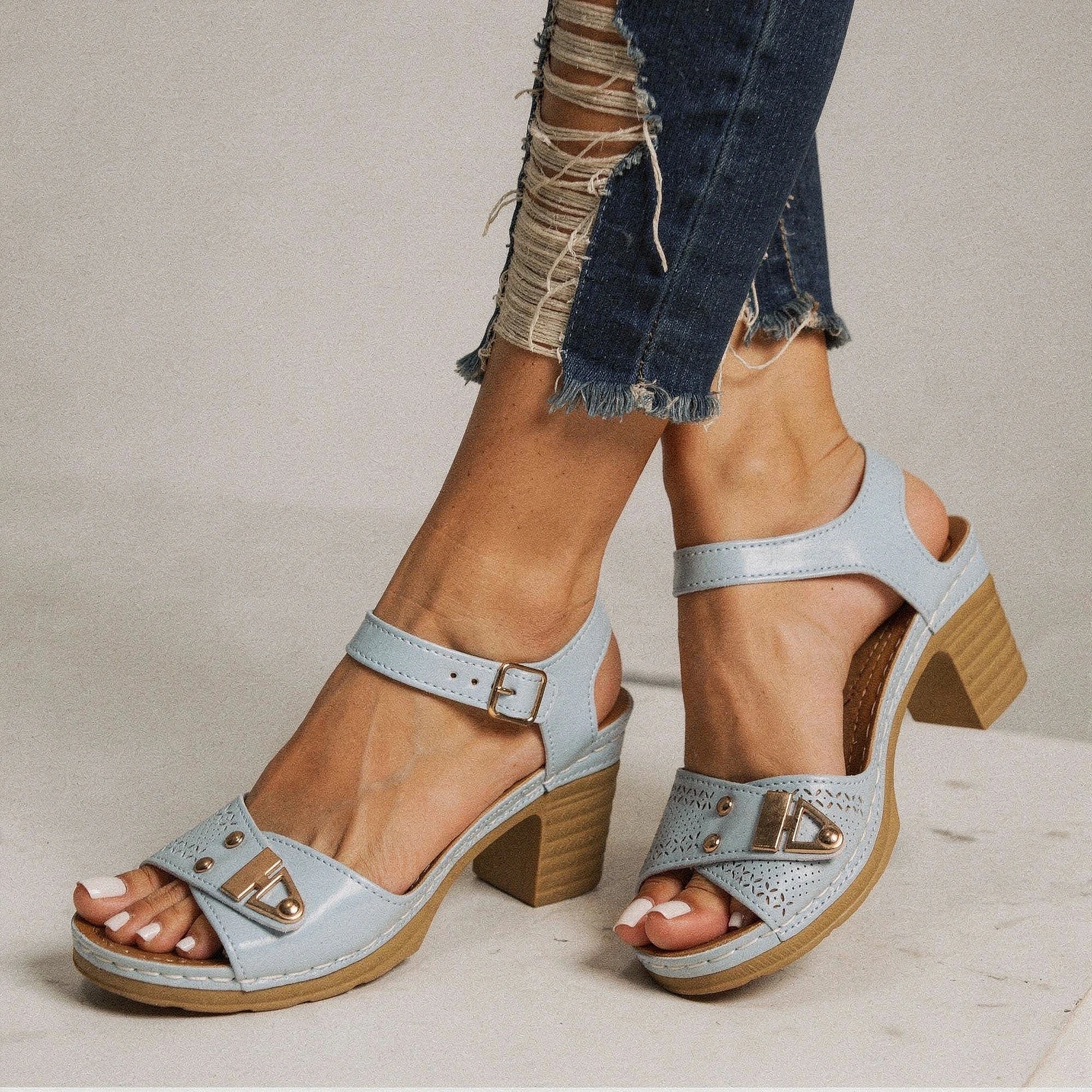 View of trendy adjustable buckle chunky heel sandals in tan, featuring a stylish design and sturdy heel for summer wear