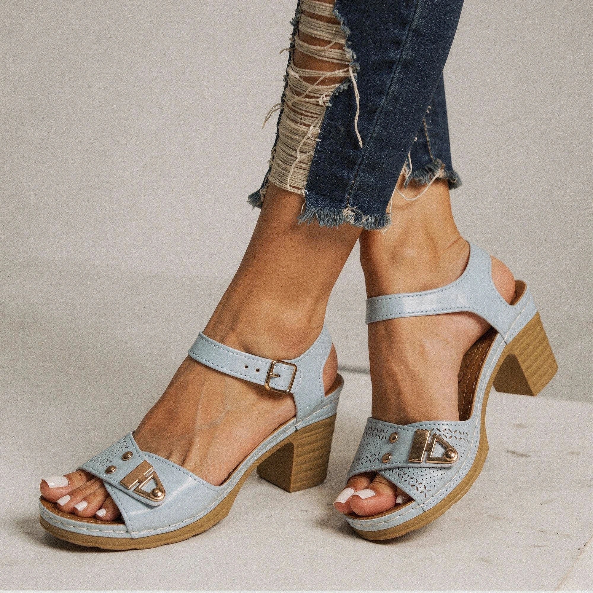 View of trendy adjustable buckle chunky heel sandals in tan, featuring a stylish design and sturdy heel for summer wear