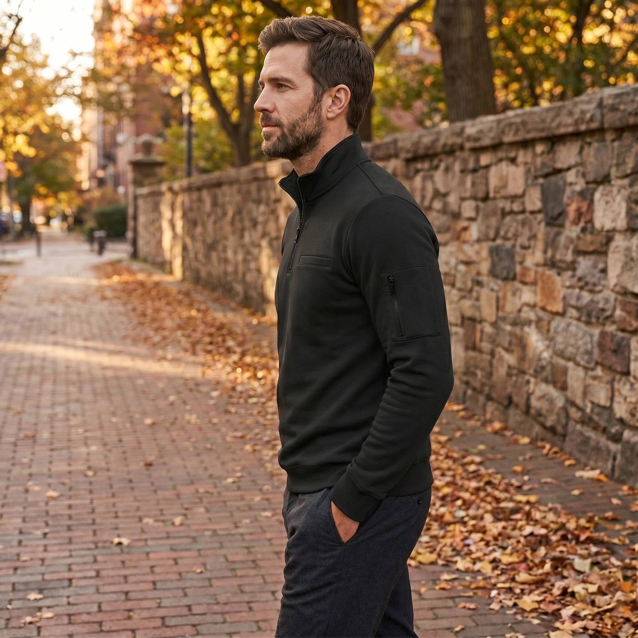 Back view of a model wearing a mens quarter zip sweater in a rich navy color, showing the premium fabric and tailored fit.