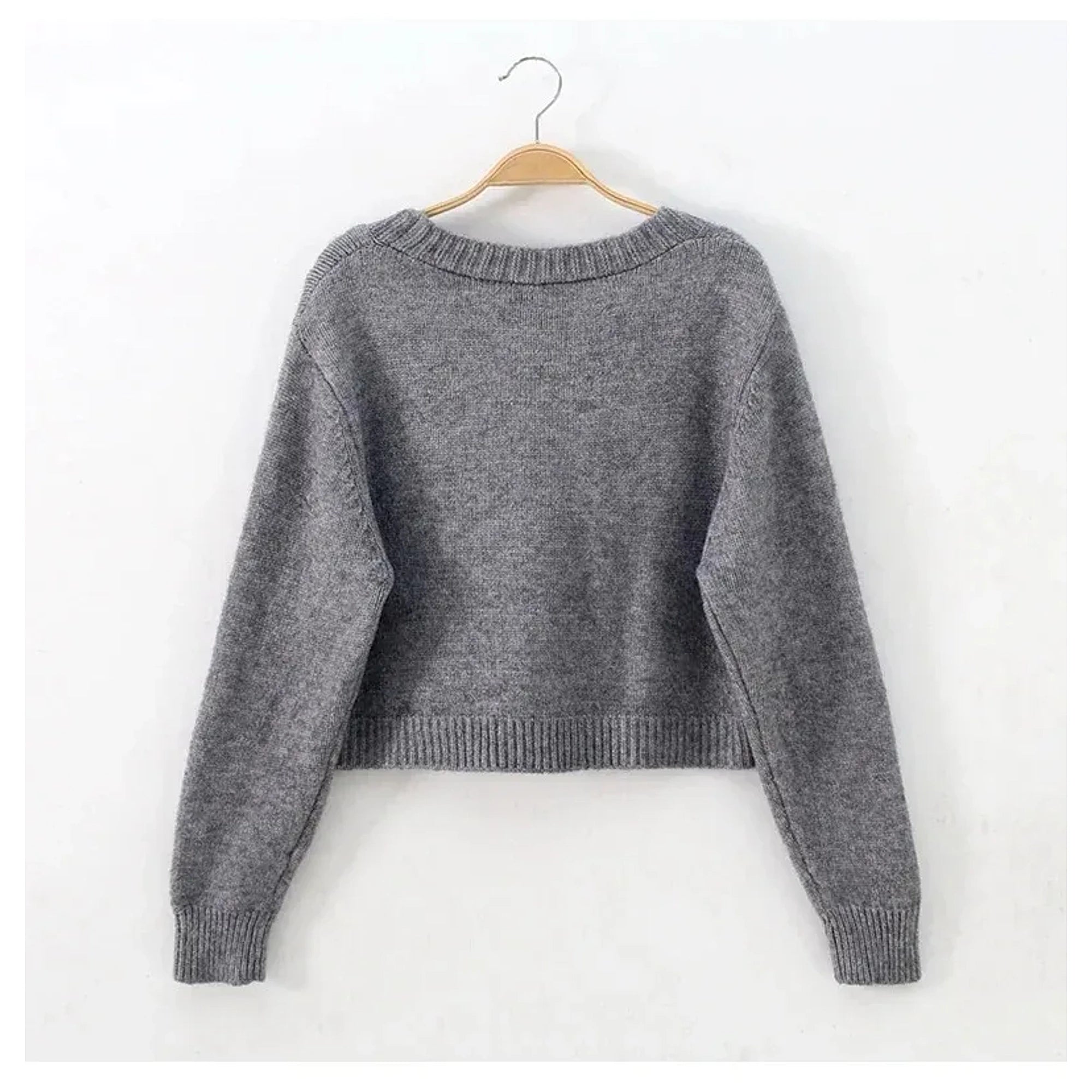 Warm cropped twist knitted sweater in soft beige, featuring a textured pattern and a relaxed fit, view