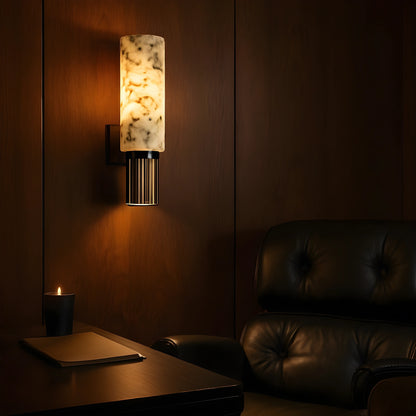 View of a chic Art Deco marble wall sconce featuring a gold metal frame and intricate geometric patterns