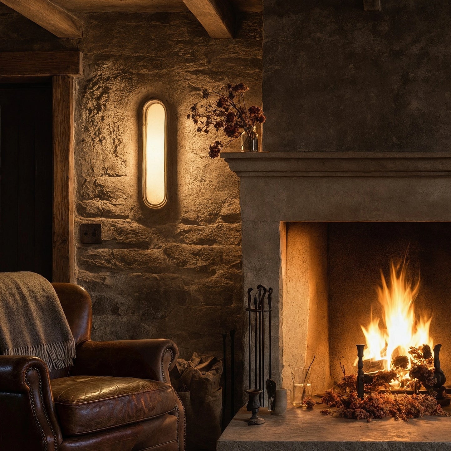 View of an elegant alabaster wall sconce featuring a sculptural design and soft ambient light