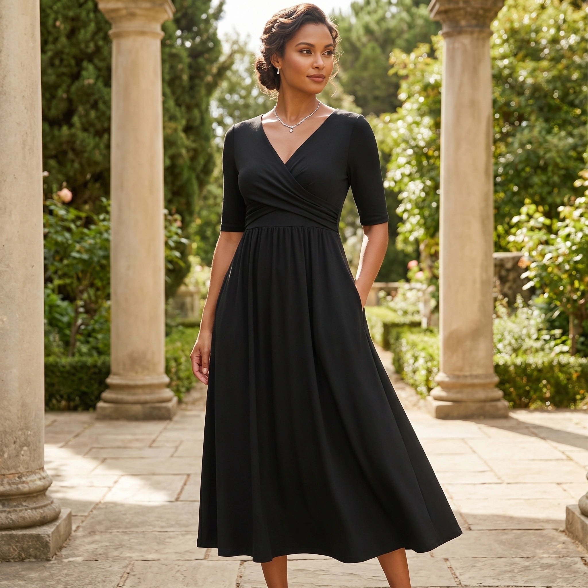 Close up of the women's flattering midi dress showing the intricate stitching and luxurious fabric texture in a rich navy blue color.