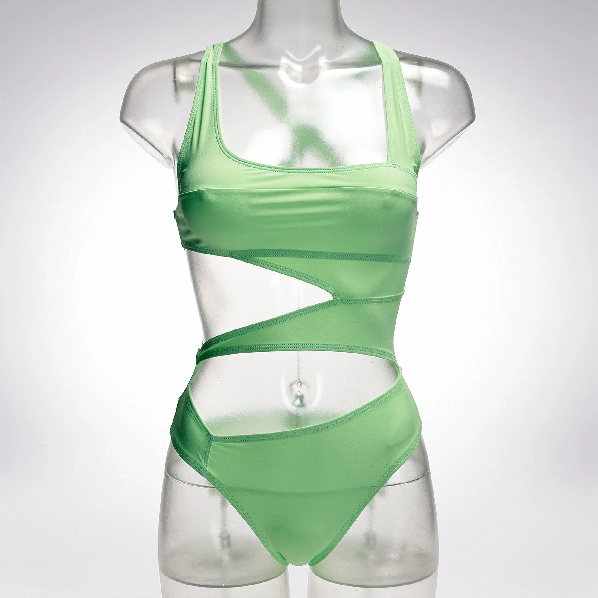 View of a black one piece swimsuit featuring a plunging neckline and elegant cutouts, showcasing smooth fabric texture
