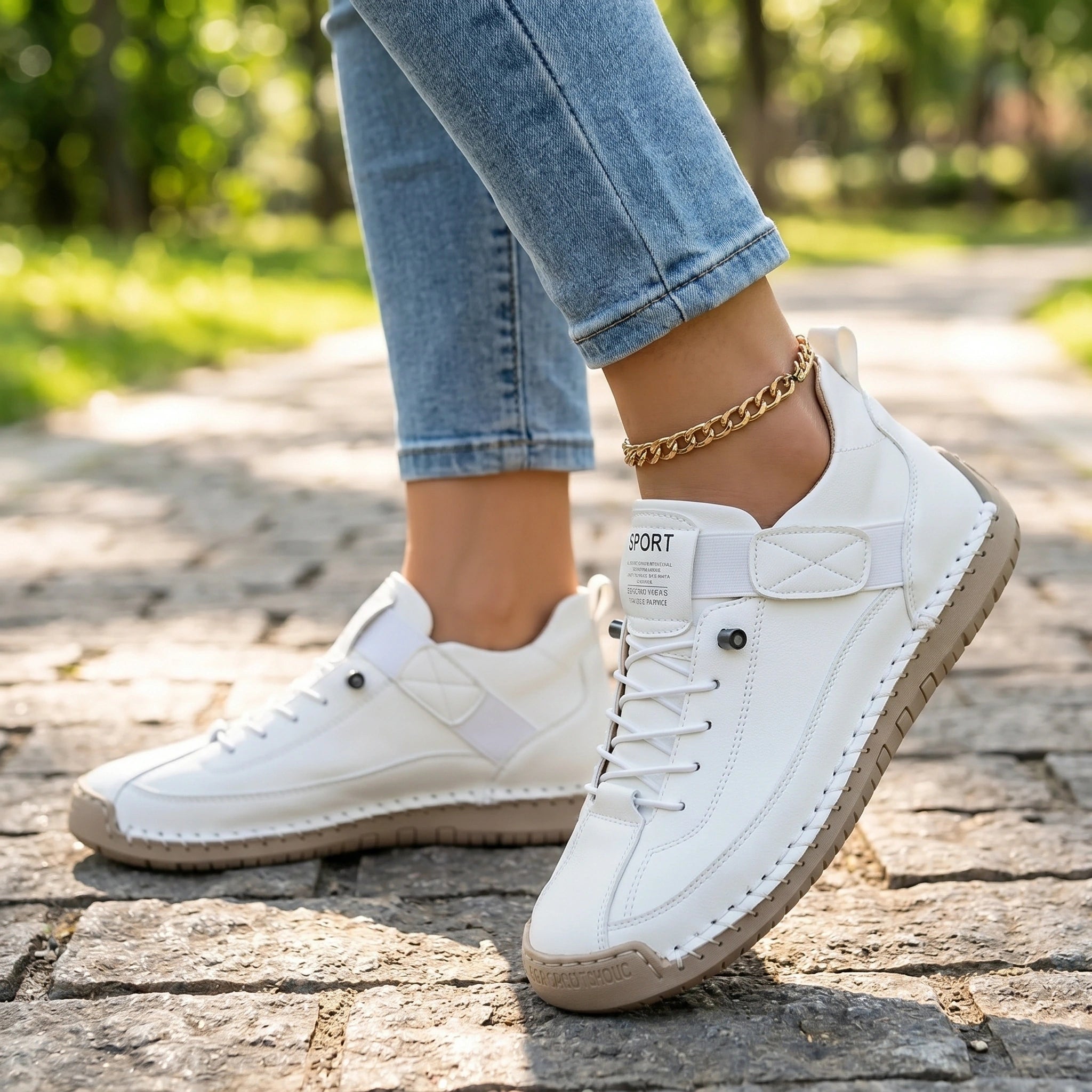 Close up of the orthopedic sneakers showing the intricate stitching and breathable fabric in a pastel color against a soft neutral background.