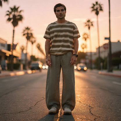 Lightweight summer trousers in a relaxed fit, featuring a subtle beige color and breathable fabric, detailed view of waistband and pockets