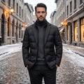 Full front view of a model showing the Mens Streamlined Winter Jacket in a rich navy color, styled with complementary winter accessories against a neutral background.