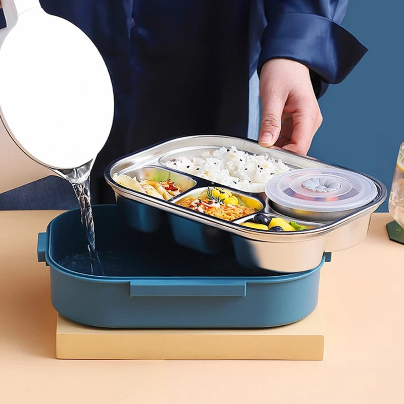 View of a modern stainless steel lunch box featuring a sleek design, durable material, and secure lid for travel
