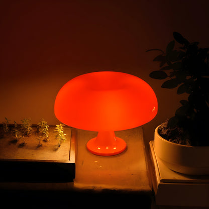 View of a contemporary sculpted acrylic mushroom table lamp in a soft white color, showcasing its elegant curves and smooth finish