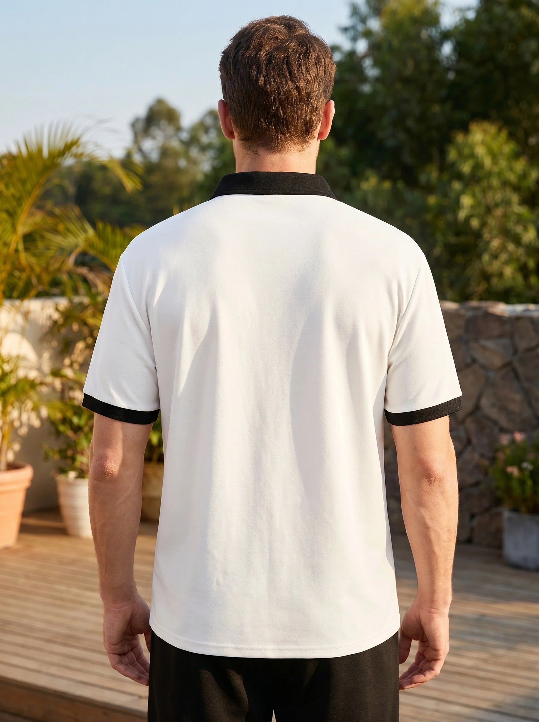 Close up view of the lightweight summer polo showing fine stitching and breathable fabric texture in a colorful, emphasizing its design for casual wear.