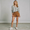 Light beige summer shorts made of soft fabric, featuring a relaxed fit and structured design, view