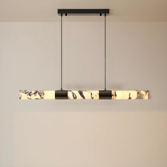 Front view of the AlabasterGlow chandelier, showing its elongated marble design, perfect for enhancing sophisticated dining room aesthetics.