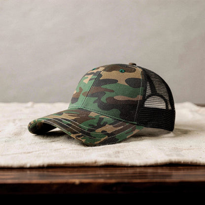 View of a relaxed vintage snapback cap in dark gray, featuring a textured fabric and adjustable strap