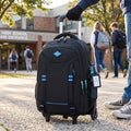 Close up view of the VoyageFlex Rolling School Backpack's durable fabric and intricate stitching, showing its quality and attention to for active boys.