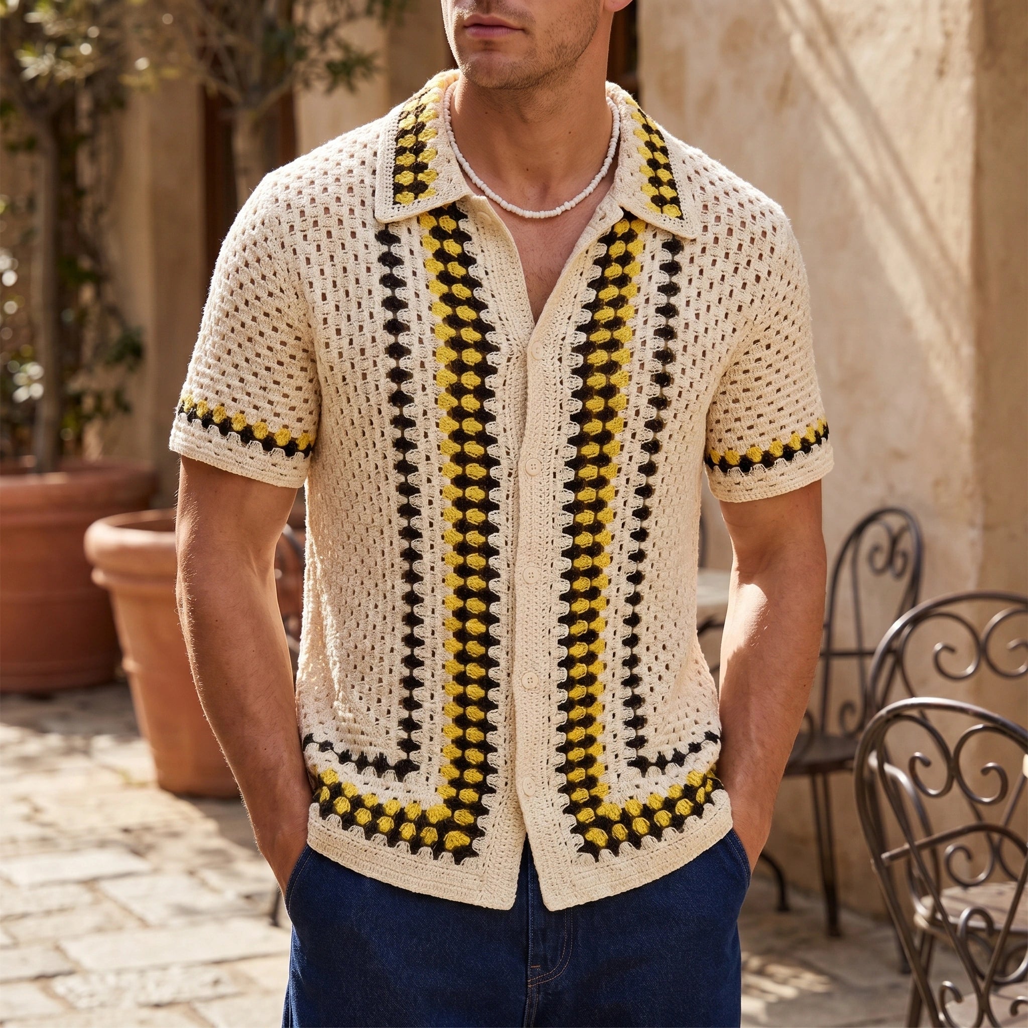 Close up view of the men's casual hand hooked knitted autumn cardigan showing its intricate stitching and rich texture against a neutral background.