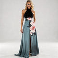 View of a flowing A line maxi dress featuring a floral pattern in soft pastel colors on lightweight fabric