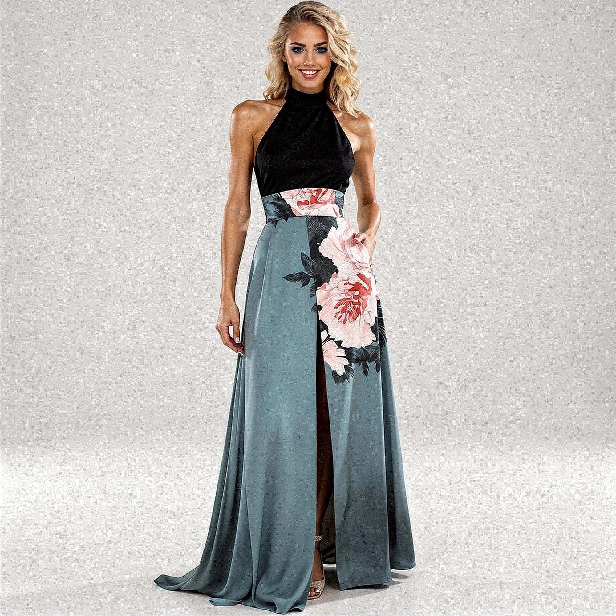View of a flowing A line maxi dress featuring a floral pattern in soft pastel colors on lightweight fabric