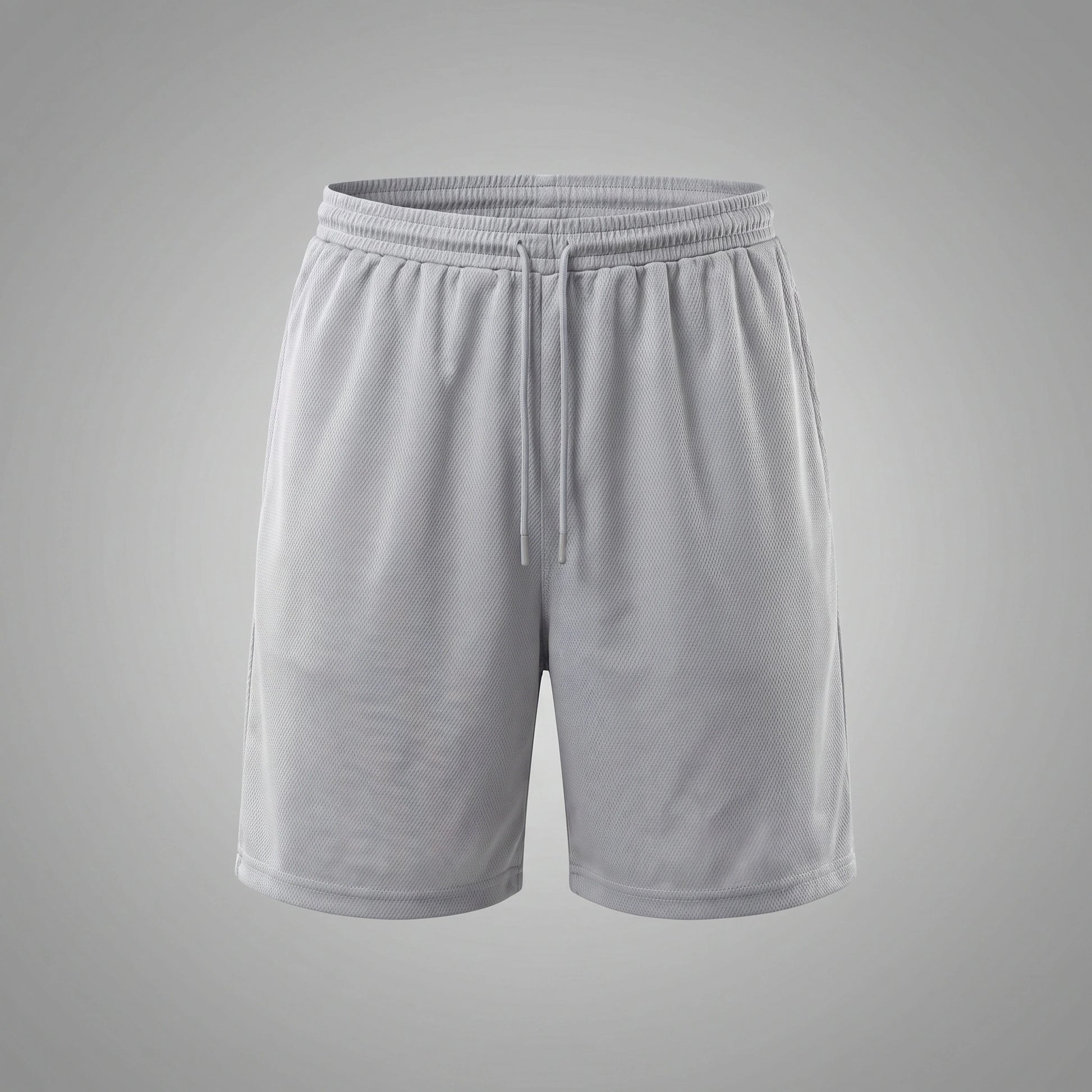 Close up view of the lightweight fabric and precise stitching of men's modern fit athletic shorts, showing their quality and performance features against a neutral background.