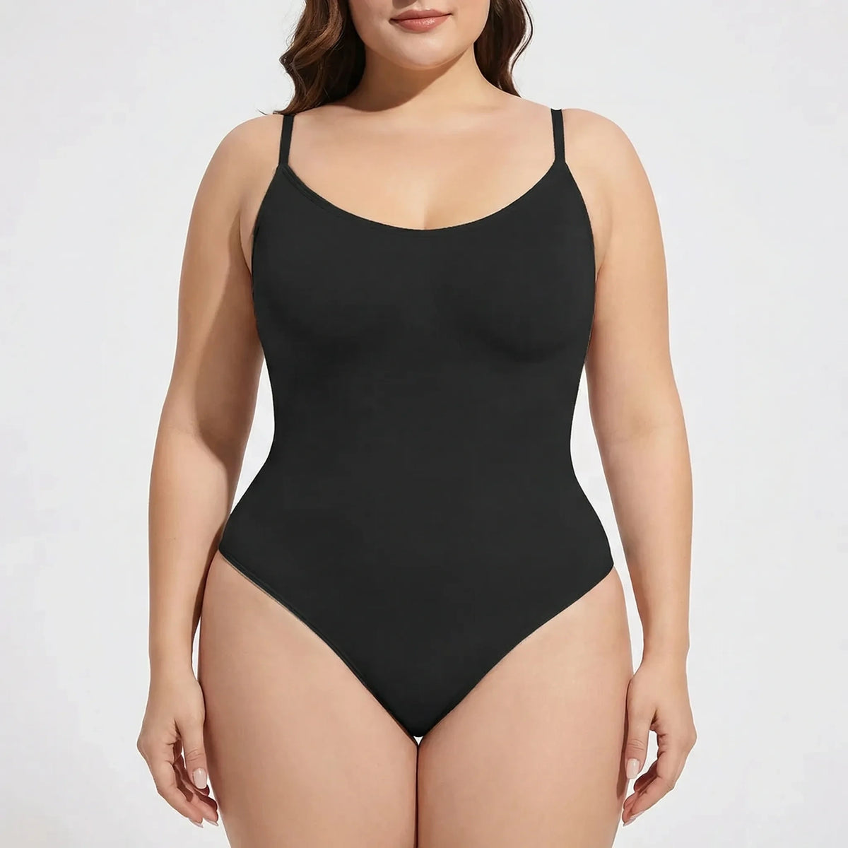Black thong bodysuit with thin straps, tummy control feature, front view — 2 — view 2