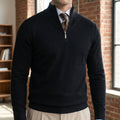 Close up view of the mens refined quarter zip sweater showing the soft fabric texture and precise stitching details against a neutral background.