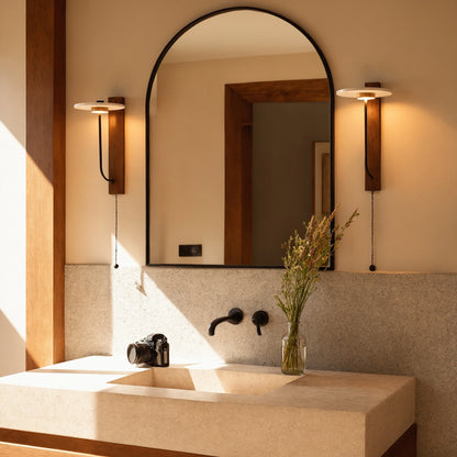 View of a stylish natural stone wall sconce featuring warm tones and textured surface, ideal for creating cozy ambiance