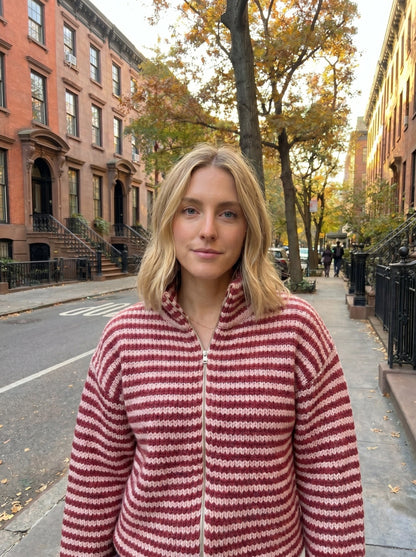 Close up view of the Womens Relaxed Striped Autumn Cardigan showing the soft fabric texture and precise stitching details in warm autumn hues.