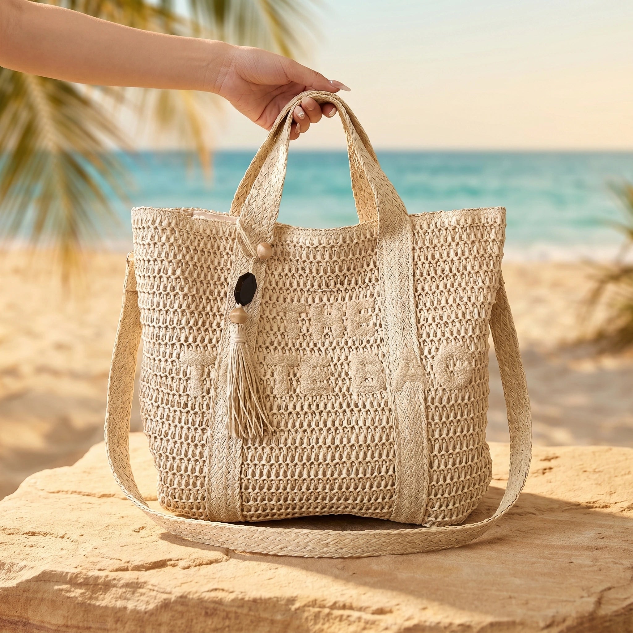 Close up of the woven straw fabric showing intricate stitching and texture, showing the tote bag's design perfect for beach outings.