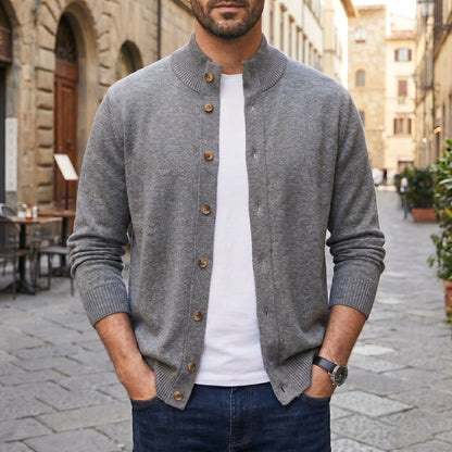Close up view of the mens button down ribbed knit sweater showing the fine stitching and luxurious fabric texture in a rich navy color.