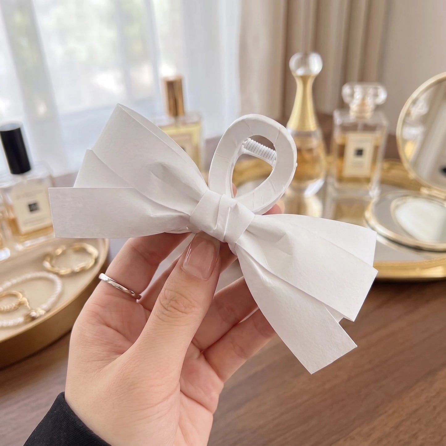 Close up view of the Womens Hair Clips showing intricate stitching and refined design details, perfect for adding sophistication to any hairstyle.