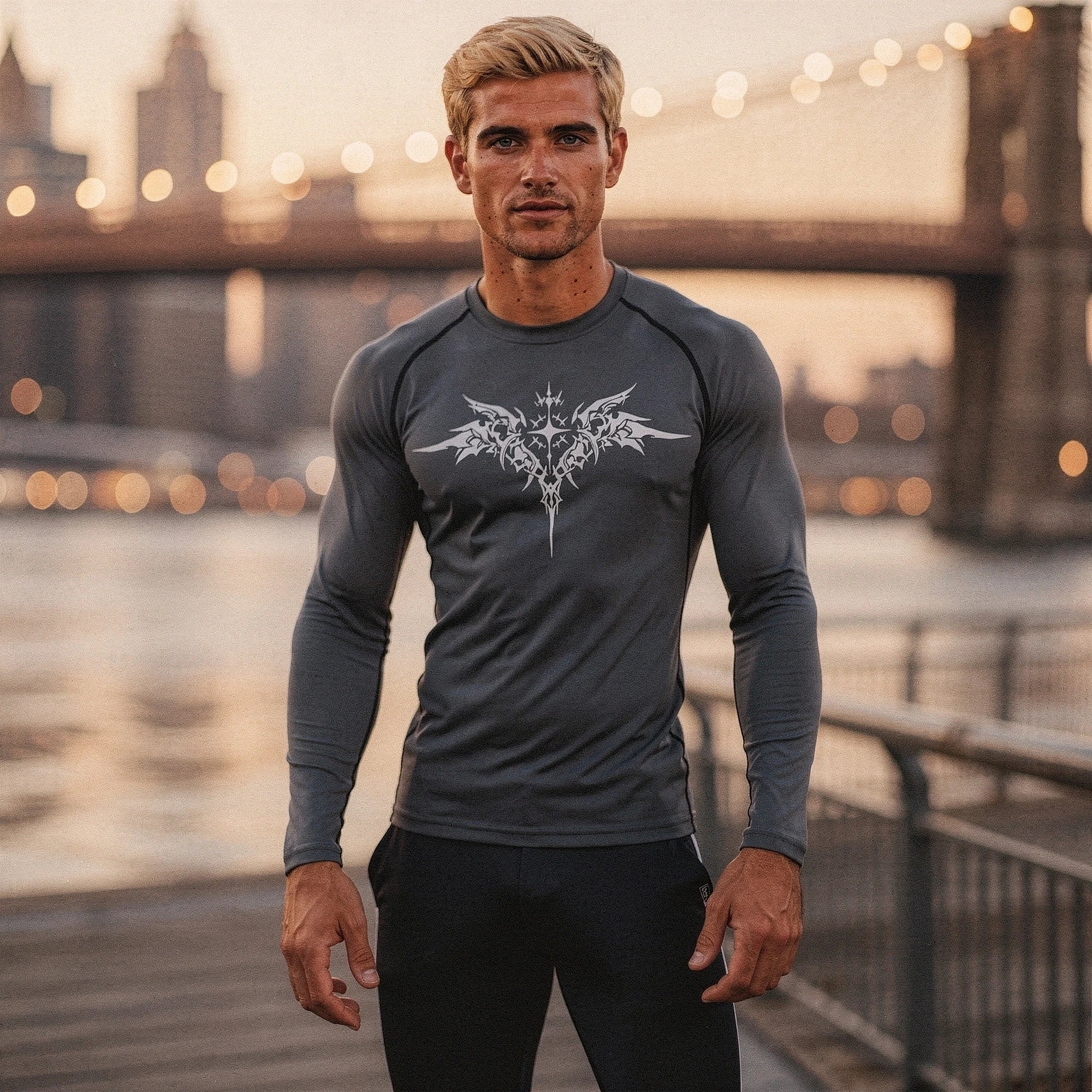 View of a black men's compression tee made from quick drying material, featuring short sleeves and a fitted design