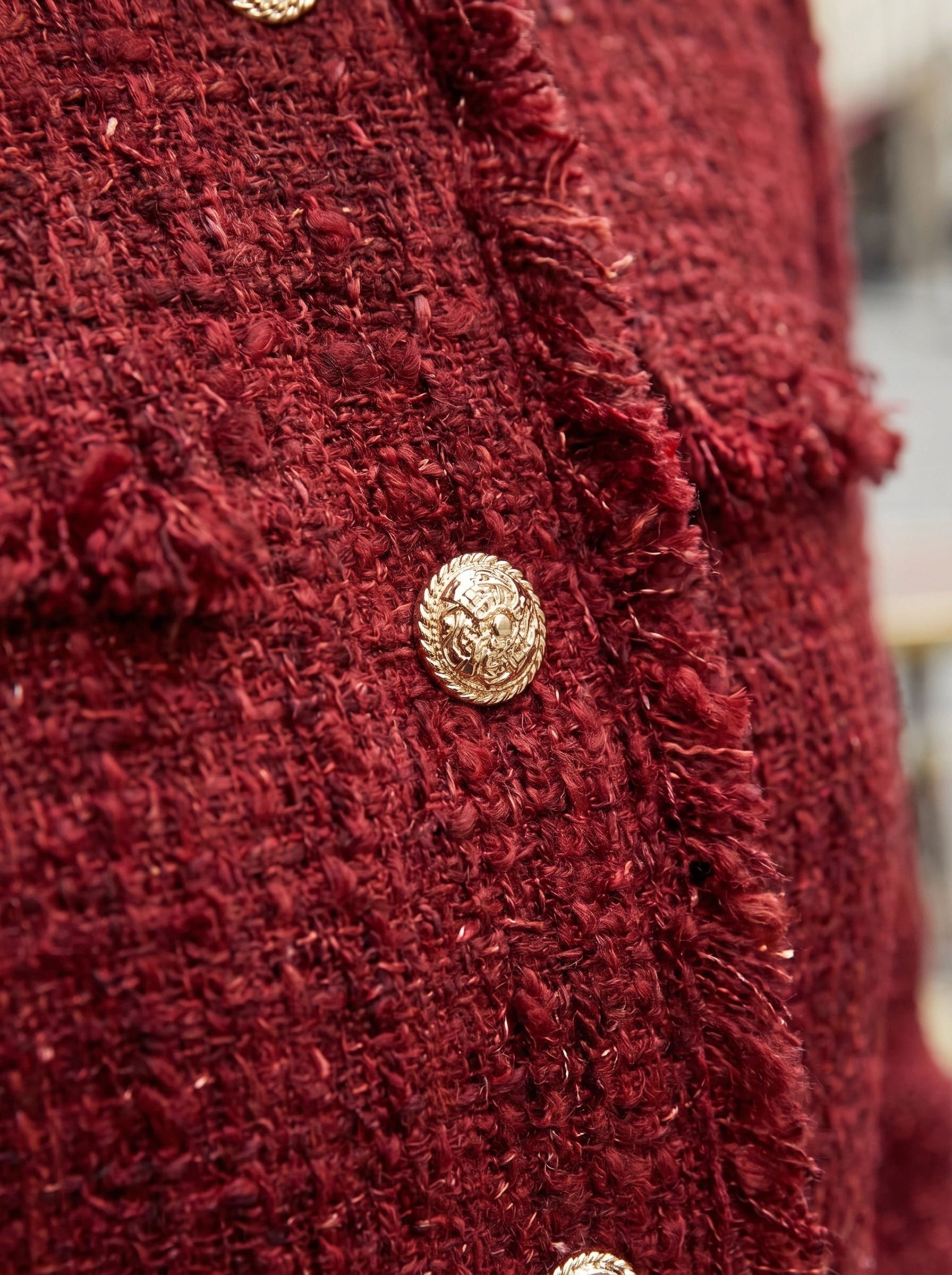Close up view of the Womens Textured Autumn Jacket showing intricate stitching and rich fabric details, showing its sophisticated design and quality craftsmanship.