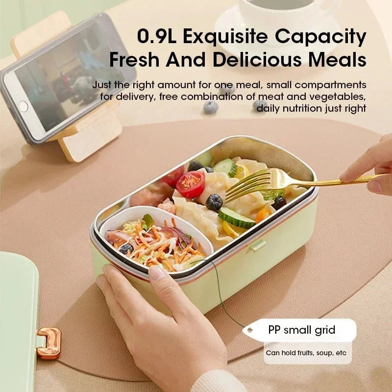 View of a compact insulated electric lunch box in sleek gray, showcasing the lid, steam vent, and user friendly design