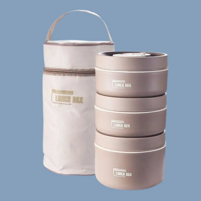 View of a chic insulated meal container set in a vibrant teal color, featuring a secure lid and convenient carrying handle