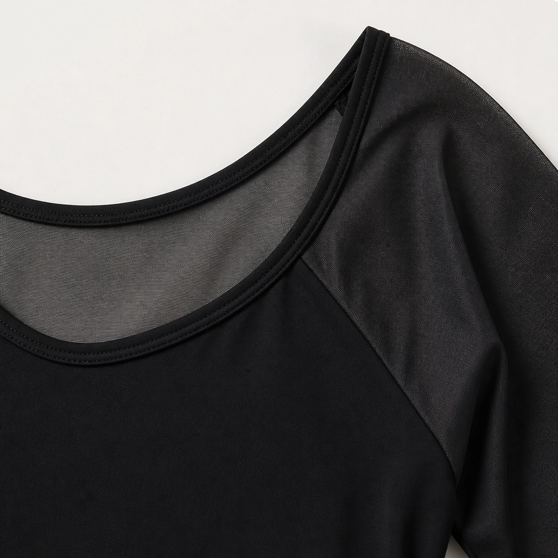 Black ballet leotard sheer mesh and neckline construction detail — view 4