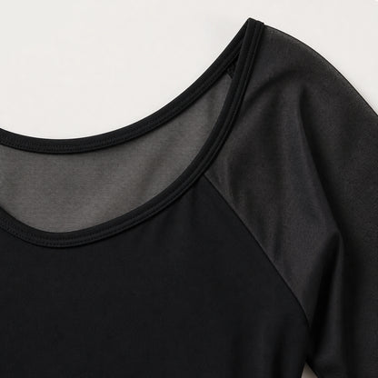 Black ballet leotard sheer mesh and neckline construction detail — view 4