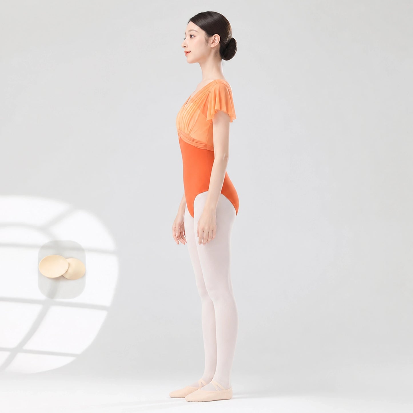 Bright orange ballet leotard side profile — view 6