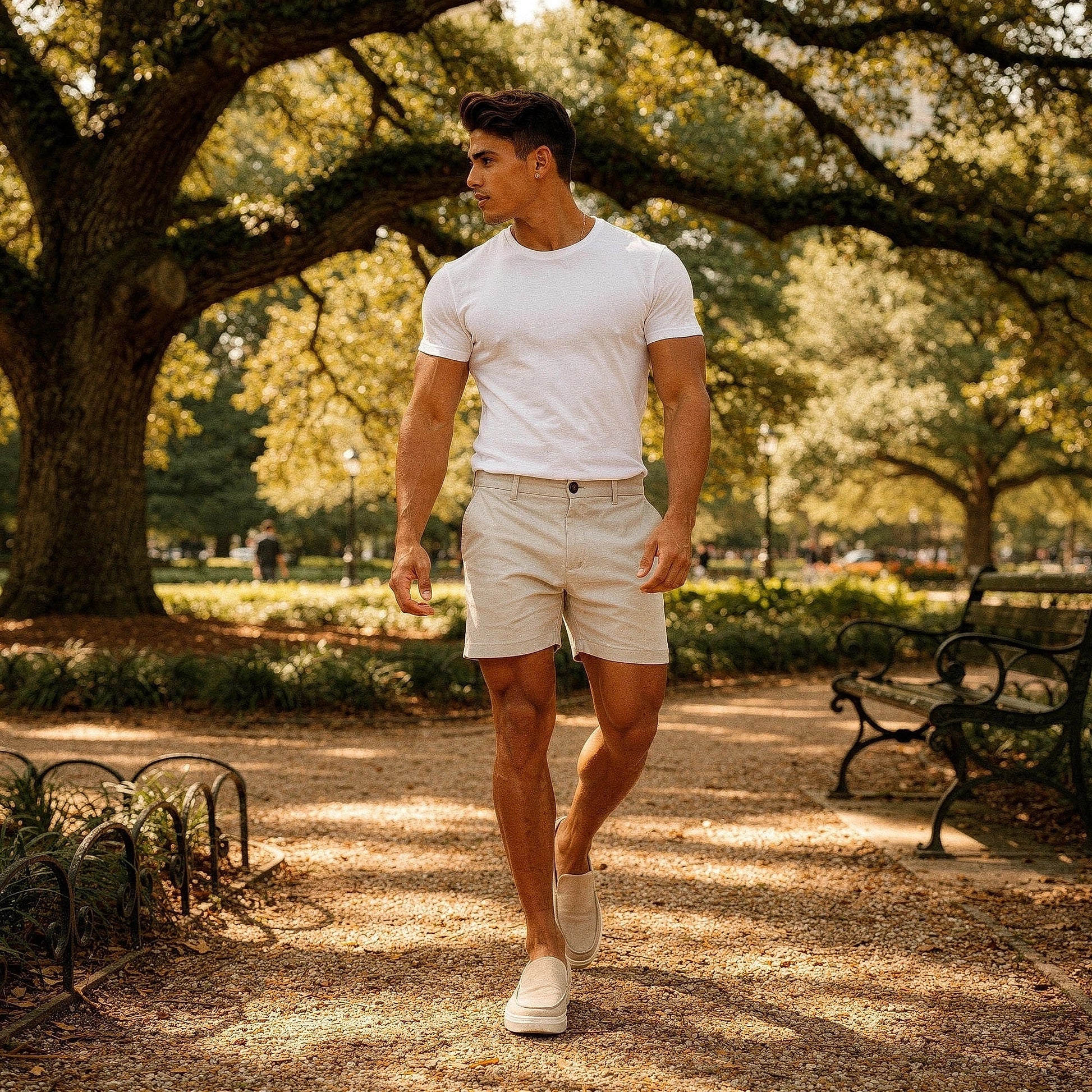 View of men's athletic fit stretch chino shorts in light beige, featuring pockets and a smooth fabric texture
