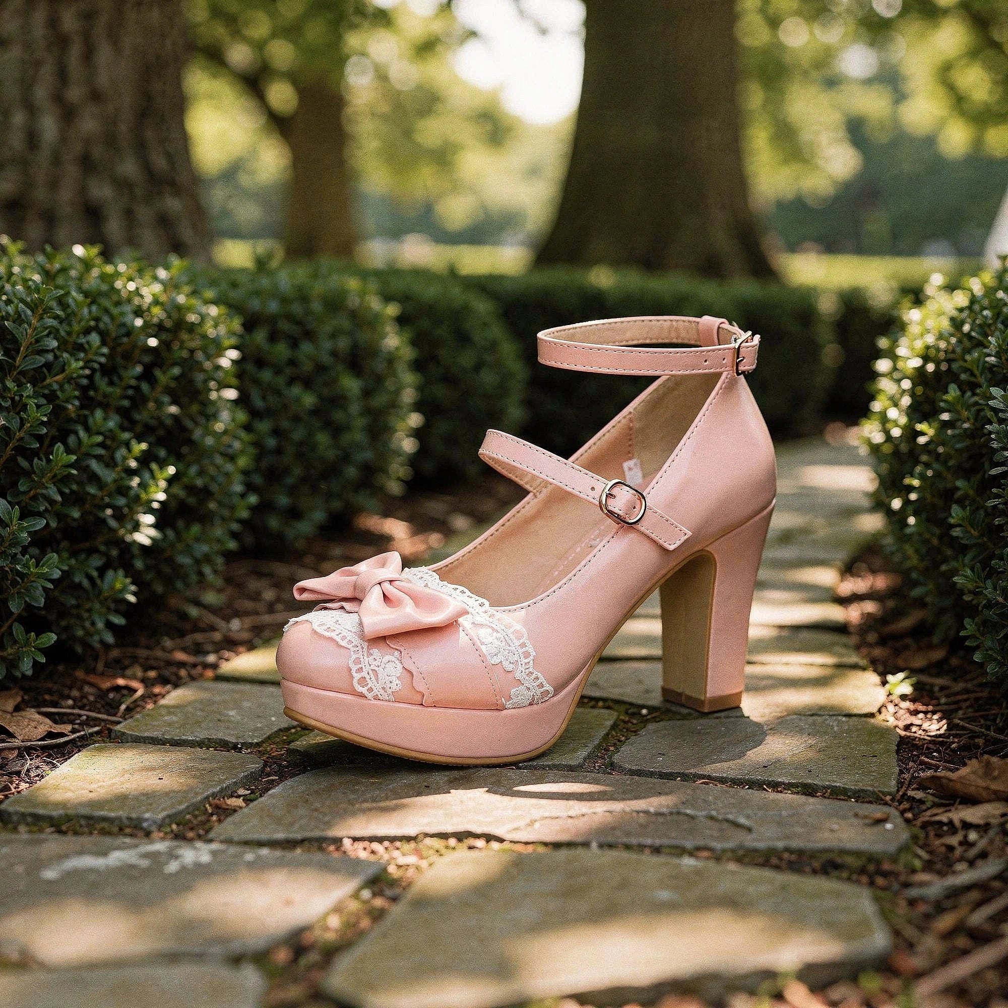 View of elegant high heeled shoes featuring soft velvet material and delicate lace frills in a rich burgundy color