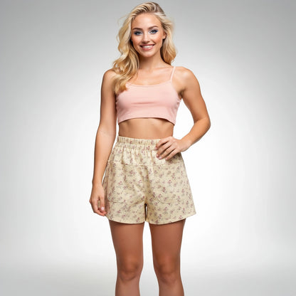 View of stylish denim shorts in light blue, featuring a relaxed fit and rolled hem for comfort