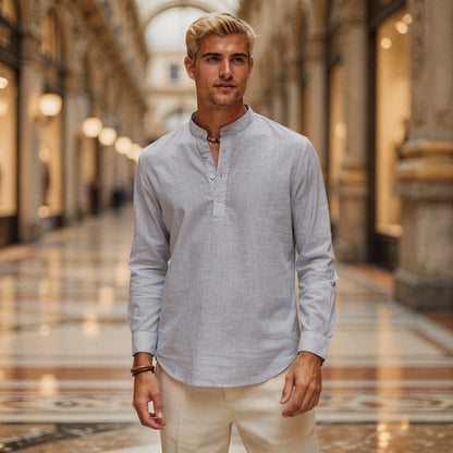 Lightweight casual henley shirt in soft cotton, featuring a relaxed fit, button placket, and long sleeves in light gray